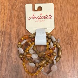 5/25$ Aeropostale Gold and Orange Layered Bracelet H14